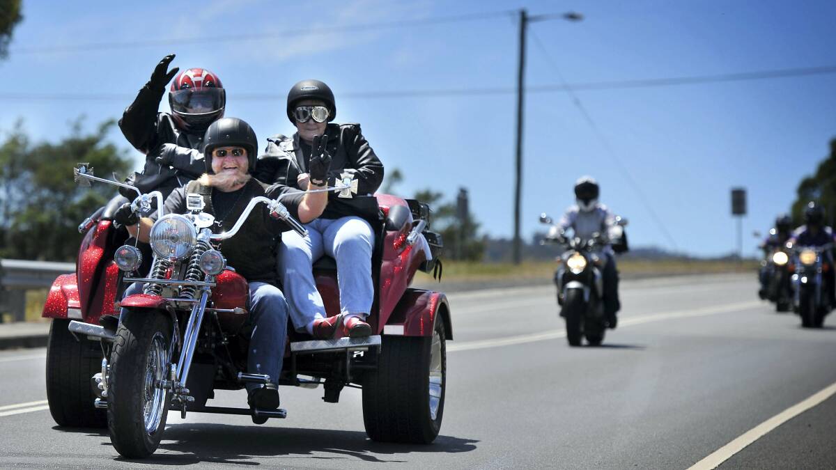 Liesje Dunn and her cousin Irene van der Leer ride with Doc from Knees to Breeze Trike Tours on their way  to Rosevears. Picture: SCOTT GELSTON