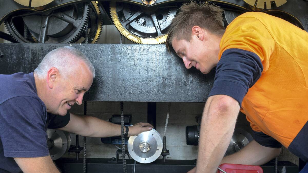 Horologist Graham Mulligan, of Clockwise, and Carlo Tedeschi, of Industrial Fire and Electrical. Picture: PHILLIP BIGGS