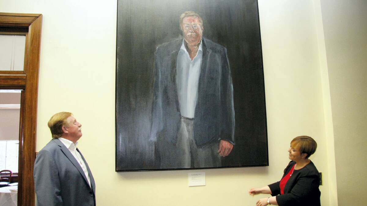  Former Tasmanian premier Paul Lennon and Premier Lara Giddings at the hanging of Mr Lennon's portrait in  Parliament House.