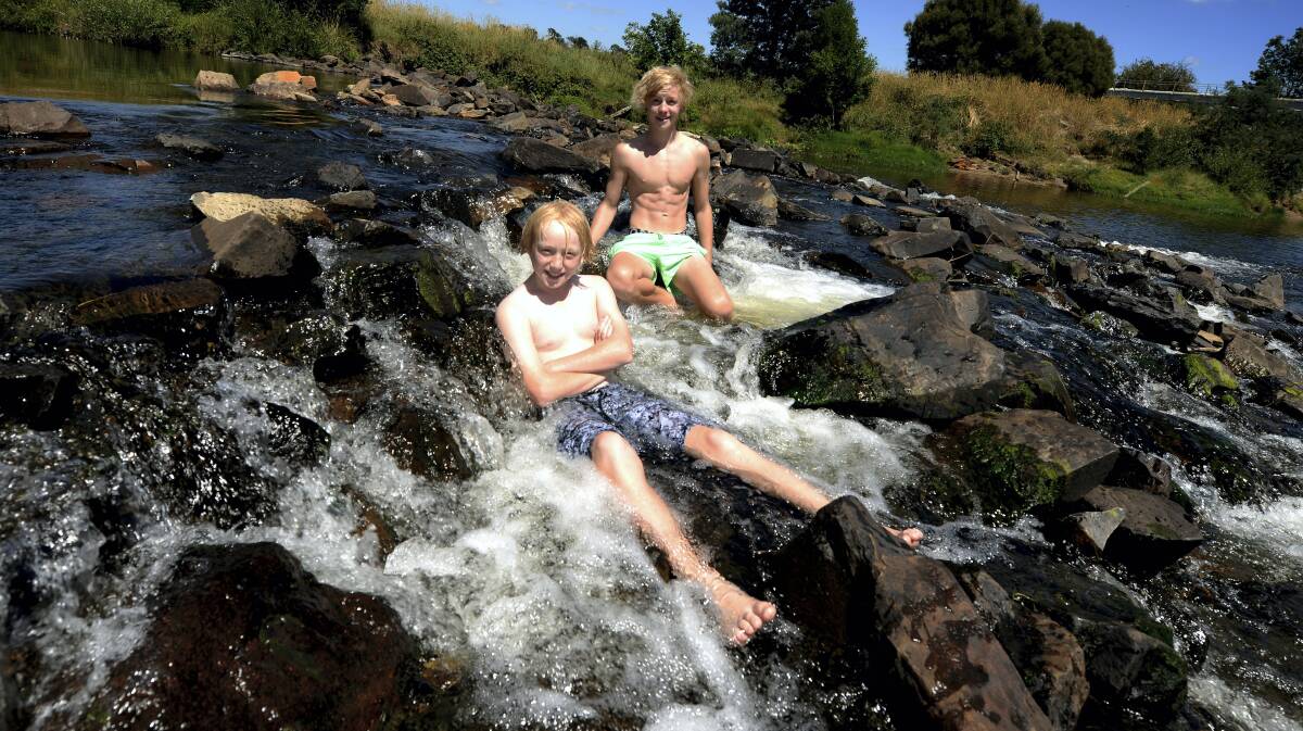 John Hutchinson, 11, and brother Dave, 14, at the St Leonards picnic ground yesterday. Picture: GEOFF ROBSON