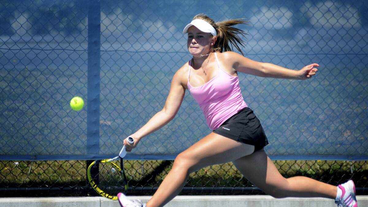 Victoria's Jayde Viccars  is at full stretch trying to  make a forehand return yesterday. Picture: GEOFF ROBSON.
