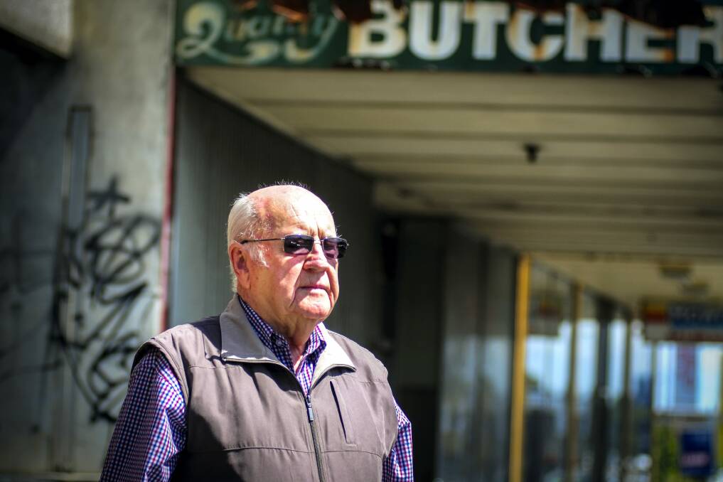 Former Launceston businessman John Stewart wants action taken over the unsightly state of an abandoned adjoining Wellington Street property.  Picture: PHILLIP BIGGS