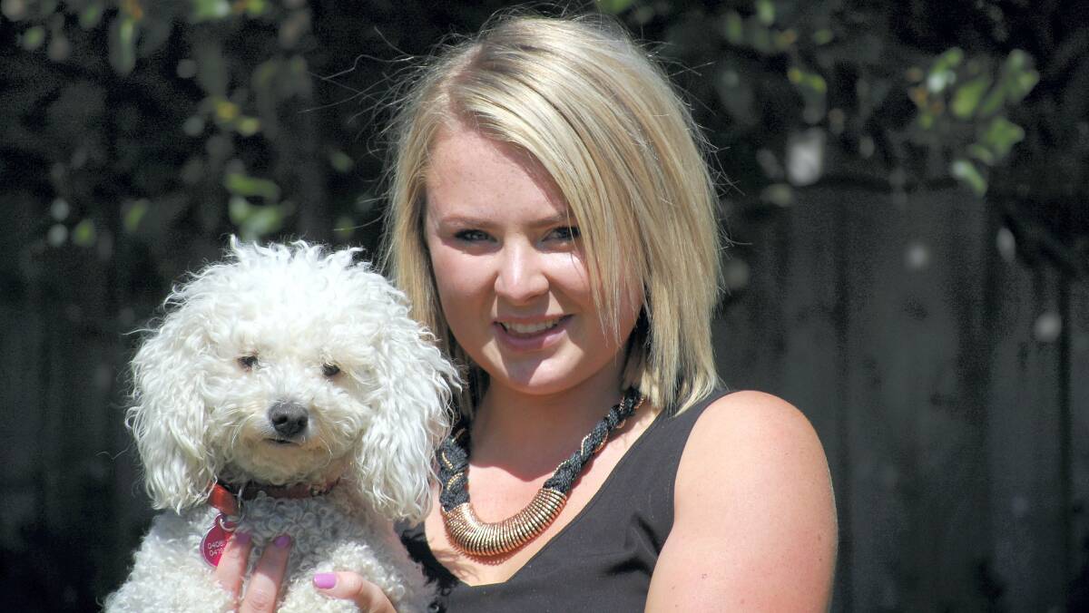 Cystic fibrosis sufferer Meg Willes, with her dog Daphne-Rose ... the West Launceston hairdresser has thrown her support behind reintroducing the Hospital in the Home program.