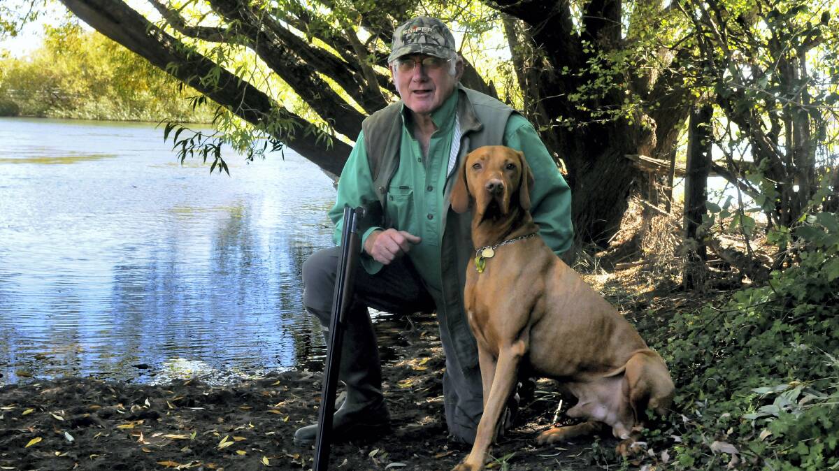  Peter Darke with his hunting dog, Kouta. 
