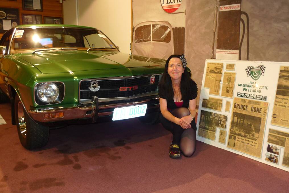 National Automobile Museum of Tasmania volunteer Tracey Klippel, of Launceston, with the iconic Holden Monaro.