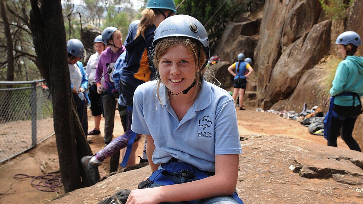 Girl Guides try rock climbing and water skiing